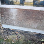 Photo of an Elementary School Window base showing corrosion
