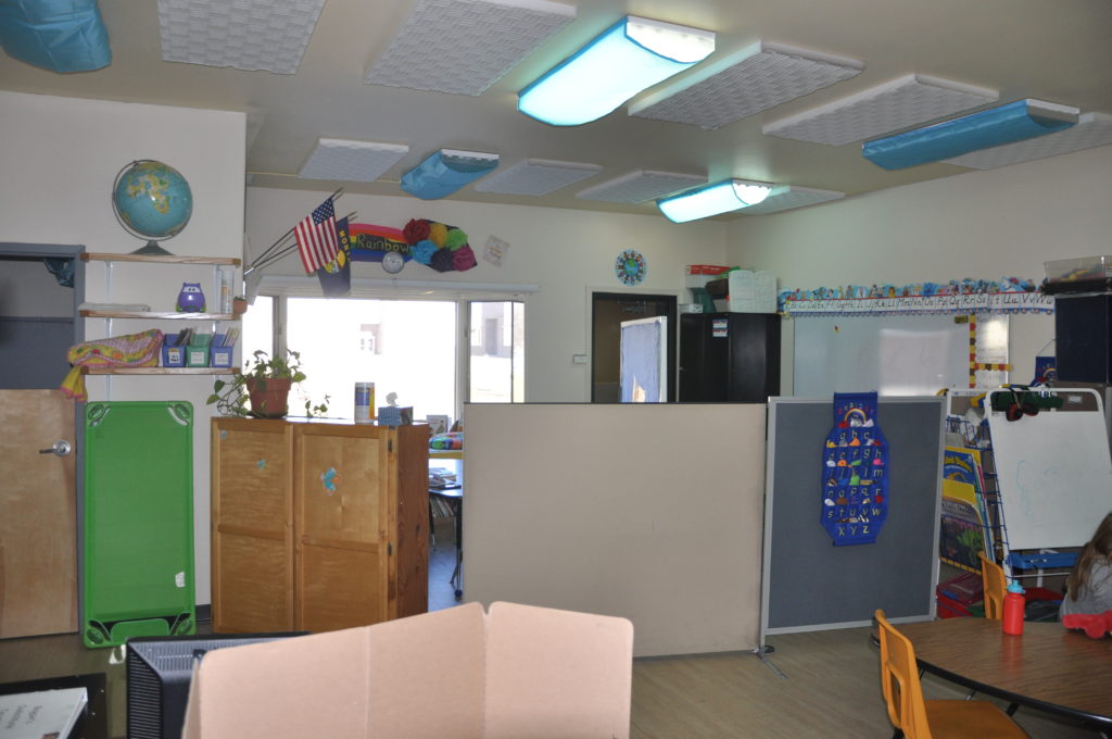 Photo of Special Education Room with make shift dividing walls.