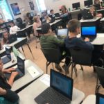 A classroom of students using their new chromebooks
